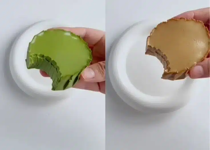 A cup of vibrant green matcha bubble tea with tapioca pearls and a straw