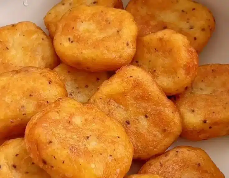 Homemade crispy chicken nuggets served with dipping sauce