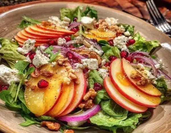 Honeycrisp Apple & Feta Salad with greens, nuts, and dressing