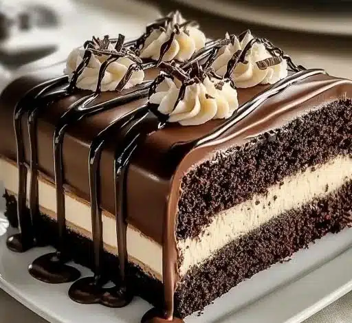 Indulgent tuxedo bar cake, a rich chocolate dessert with layers and flavor.