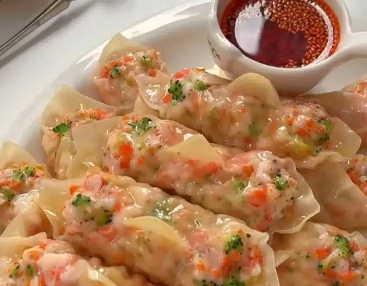 Low-calorie veggie shrimp dumplings served with dipping sauce