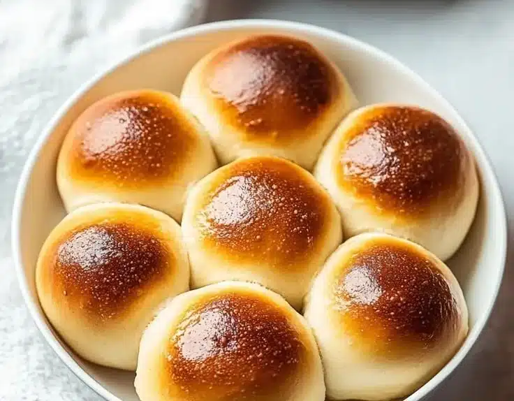 Soft gluten free dinner rolls that melt in your mouth, perfect for any meal.